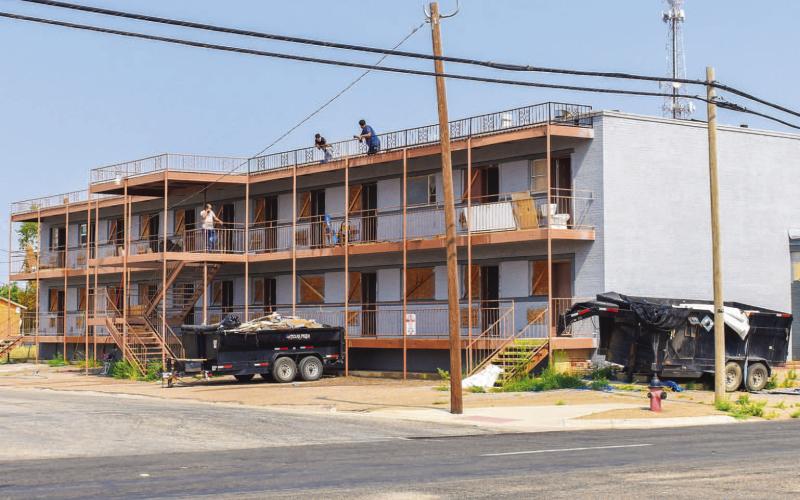 TEAR DOWN - A construction crew has been spending the week doing demolition for what was the Legacy Apartments.