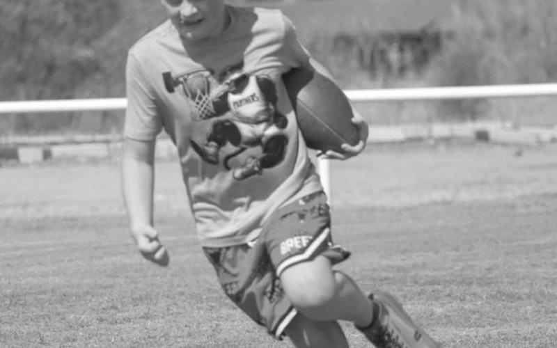 QUICK CUTS - Whitharral Panther Lincoln Griffith ran the football this past Monday at the Whitharral All-Sports Camp at the football field. (Staff photo by Aalijah Soliz)