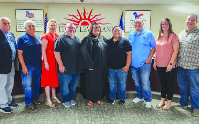NEW MUNICIPAL COURT JUDGE - During a special meeting held Monday evening by the Levelland City Council, former Municipal Court Clerk Esmeralda Rowand was appointed as the new municipal court judge following the unanimous approval of the Council. Rowand has accumulated 20-plus years of experience in her former position. Pictured from left to right are: Councilman Bill Powell, Councilman Max Ledesma, Mayor Breann Buxkemper, husband Michael Rowand, Municipal Court Judge Esmeralda Rowand, son Luke Rowand, son B