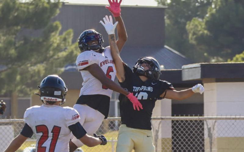 MAN TO MAN - Levelland Lobo Eryk Jones contested the deep pass this past Thursday on the road against the Big Spring Steers in the team’s last scrimmage before the start of the reguar season. (Staff photo by Aalijah Soliz)