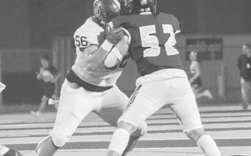 STONEWALL - Levelland Lobo Matt Romero held the Pecos Eagle defender in place during the team’s win over Pecos last Friday on the road. (Staff photo by Aalijah Soliz)