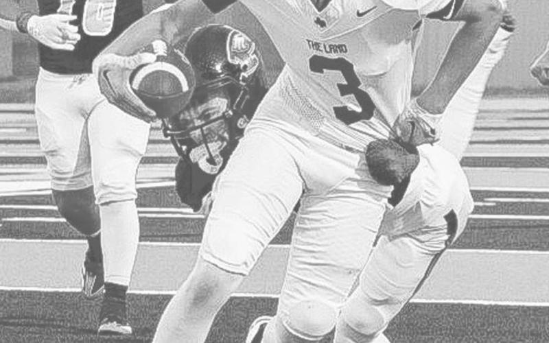 TOO STRONG - Lobo Gage Potter dragged a Pecos defender after his catch last Friday against the Pecos Eagles in their road win. (Staff photo by Aalijah Soliz)