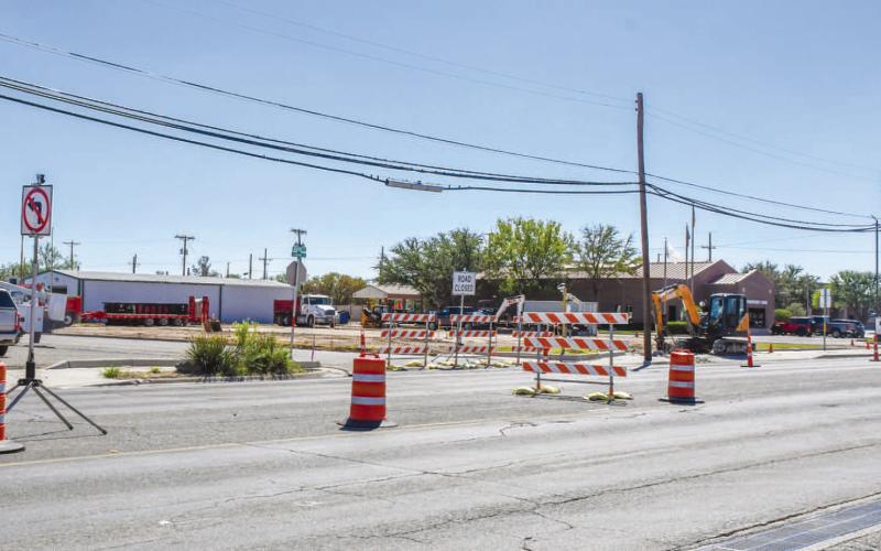 BREAKING GROUND - The early stages of construction have begun on the lot located at 301 College Avenue. Last week, demolition of the parking lot area within the plot was underway for what will become Wendy’s. The turnoff from College Avenue onto Walnut Street was blocked off as work was being done alongside the lot. (Staff photo by Evin Thomas)