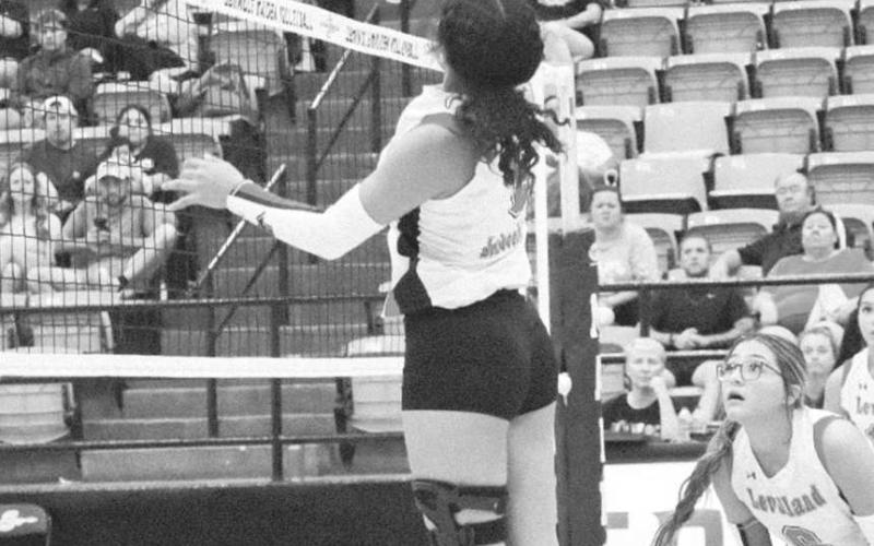 TIPPED OVER - Levelland Loboette Mia Sepulbeda tipped the ball over the net against the Seminole Maidens last Tuesday on the road. The Loboettes start district play this Saturday at 12 p.m. against the San Angelo Lake View Maidens. (Staff photo by Aalijah Soli