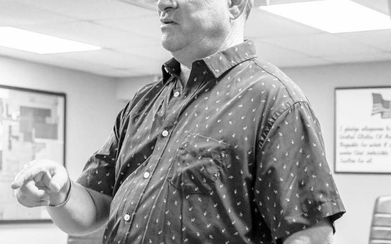 TOWN HALL TOUR - Texas Representative of District 88, Ken King spoke at Levelland’s City Hall Wednesday morning to address priorities and answer audience questions about the upcoming legislative session. The visit was part of King’s Town Hall tour, a prelude to the legislative session that will begin in January. King spoke about several topics that are to be addressed in the legislature, including public education. Pictured is King speaking to community members at the Levelland City Hall. (Staff photo by Ev