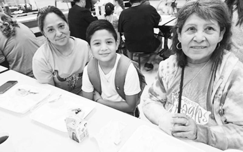 GRANDPARENTS DAY - South Elementary celebrated Grandparents Day last Monday. Several grandparents showed up and had breakfast with thier grandchildren. Pictured are 4th-Grader Javier Martha from Mrs. Lacey Guzman's class with his grandmother Janice Marth Lopez and his great-grandmother Cathy Martha. (Photo courtsey of Cristal Isaacks)