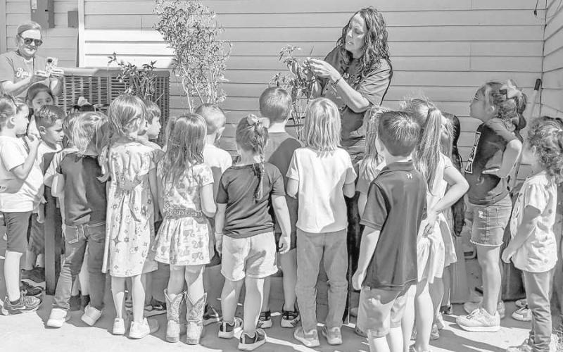 LIBRARY’S LITTLE HELPERS - The kindergarten class of Sundown ISD has adopted the City of Sundown Library as its annual service project. Veteran teacher Stacey Buchanan approached Director A’ndrea McAdams and asked if they could help the library. It was perfect timing as McAdams was finalizing the Parkhill Building Community grant by adding plants to the front landscaping. On October 7, the two teachers–Buchanan and Jacei Barrera–walked the students a block to the library. Upon arrival, McAdams read a book p