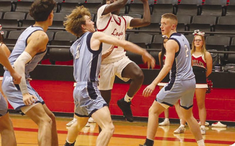 ATHLETIC FINISH - Levelland Lobo Elijah Jordan layed the ball up through contact in the team’s game against the Greenwood Rangers this past Tuesday at home. (Staff photo by Aalijah Soliz)