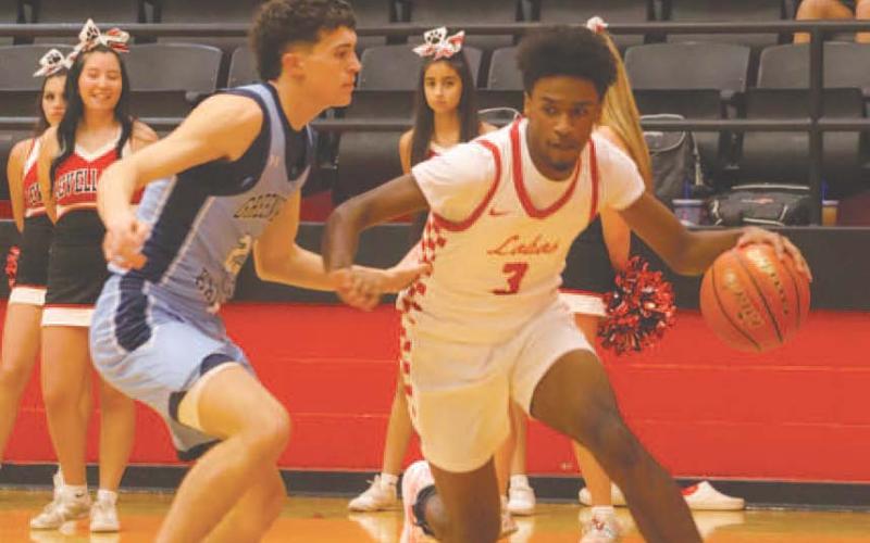 BLOW BY - Levelland Lobo Eryk Jones blew past his defender last Tuesday against the Greenwood Rangers at home. (Staff photo by Aalijah Soliz)