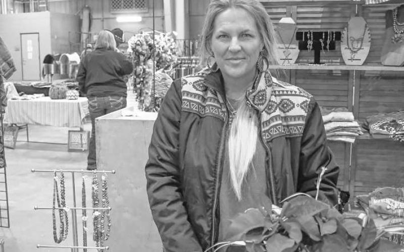 BOUTIQUE – Carrie DeArmond sold clothes and accessories out of her booth at the Clovis Horse Sale trade show on Nov. 23 in Levelland. (Staff photo by Evin Thomas)