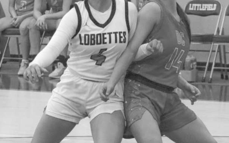 REBOUNDING BATTLE - Levelland Loboette Mia Morin fought for positioning to grab the rebound during the team’s game against Denver City in the Littlefield Tournament. (Staff photo by Aalijah Soliz)