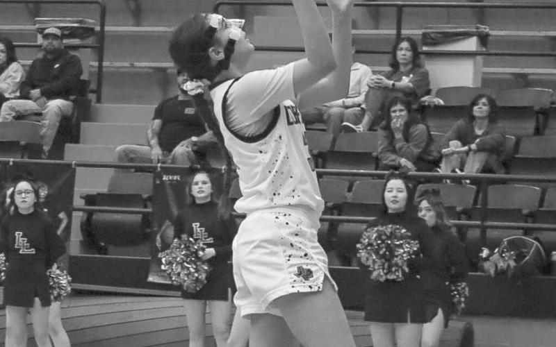 FASTBREAK - Levelland Loboette Leilani Sanchez layed the ball up during the team’s fastbreak chance this past Tuesday night at home against the Lady Tigers. (Staff photo by Aalijah Soliz
