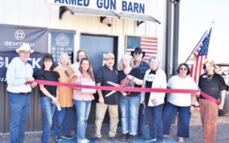 ARMED GUN BARN RIBBON CUTTING