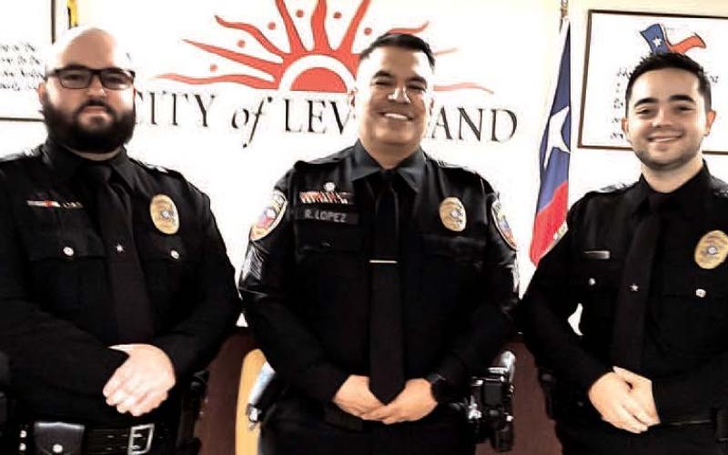 LPD EARNING THE BADGE LPD Promotions - Levelland Police Department officers Cory Painter, Raul Lopez and Baxton Gilbreath were joined by Mayor Breann Buxkemper, council members Bobby Morris, Tushar Bhatka, Angie Yandell and Michael Stueart as LPD Police Chief Erica O’Bryon promoted the three to sergeant. Painter has five years of law enforcement experience; Gilbreath has been serving as a field training officer with LPD since graduating from SPC Law Enforcement Academy in 2023; and Lope z has a cumula tive