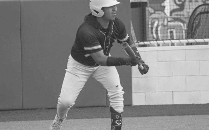 BUNT - Ropes Eagle Elijah Flores showed bunt during the team’s game against the Lions this past Thusday night at the Littlefield Baseball Fields. (Staff photo by Aalijah Soliz)