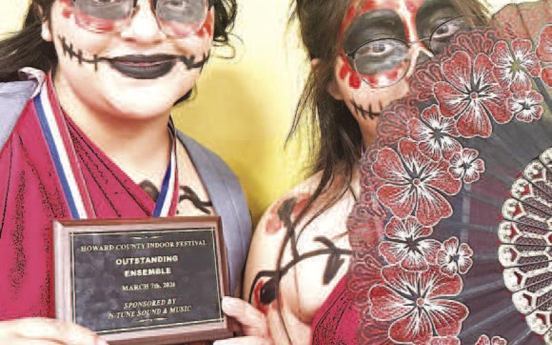LHS ENSEMBLE OUTSTANDING ENSEMBLE-- Levelland HS Allegro Winterguard Breanna Garza and Rosa Servin earned Division 1 ratings for their ensemble and were also awarded Outstanding Ensemble of the Day at the Howard County Indoor Festival.(Levelland ISD photo)