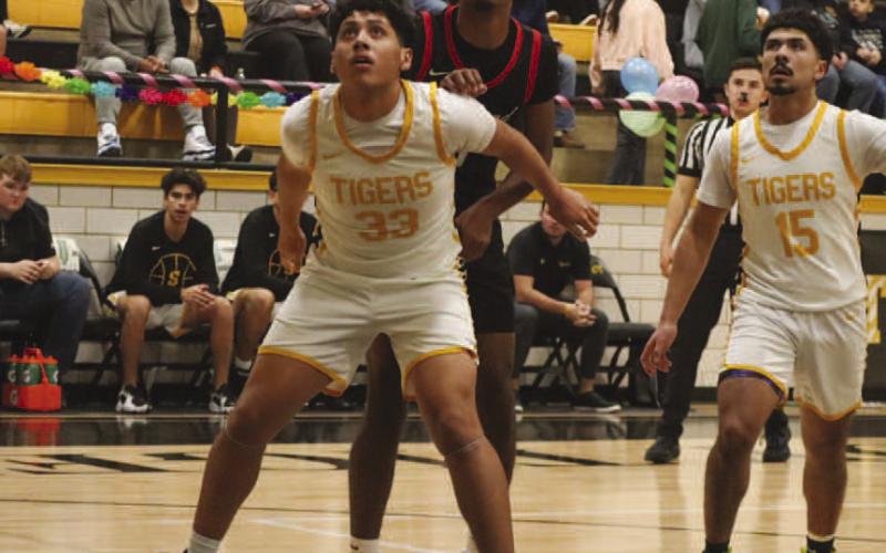 REBOUND - Levelland Lobo Eryk Jones fought for positioning underneath the basket this past Friday night against the Snyder Tigers in district play. (Staff photo by Aalijah Soliz)