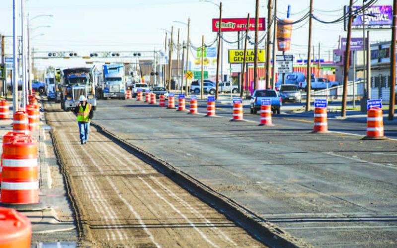 DRIVE WITH CAUTION - TxDOT has began milling the south bound lanes of College Avenue between McDonald’s (College Avenue and Houston) and N. Highway 114. With multiple traffic lights turned into four-way stops and traffic being pushed to the north bound lanes of College Avenue, community members and commuters are asked to be vigilant while traveling through the area. Pictured are semi’s preparing to be filled with milled asphalt. (Staff photo by Dom Puente)