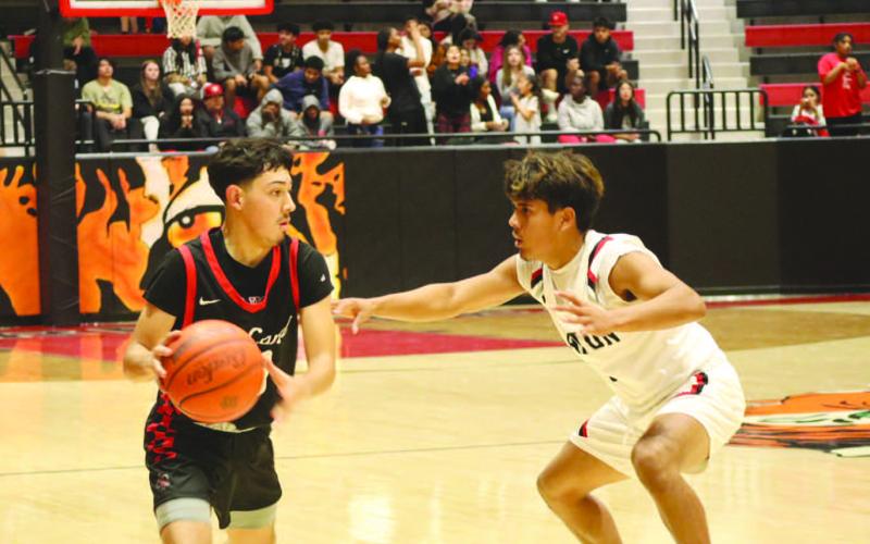 AGGRESIVE - Levelland Lobo Ozzie Salano kept attacking the paint during the teams game against the Slaton Tigers Nov. 17. (Staff photo by Aalijah Soliz)
