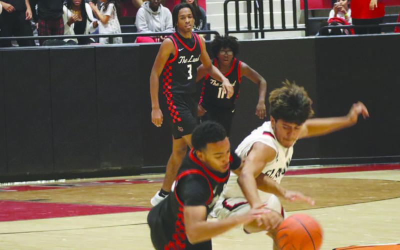 DEFENSE - Levelland Lobo Jaden Castillo poked the ball loose in the teams win to force a turnover against the Slaton Tigers. (Staff photo by Aalijah Soliz)