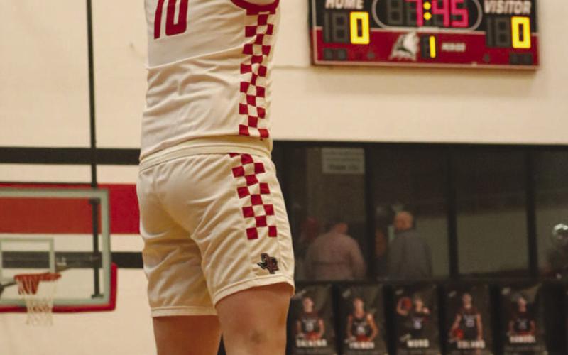 LONG-RANGE SHOT - Levelland Lobo Graham Gibbs started the Lobos off right as he got the team’s first nine points from three-point shots this past Tuesday night against Snyder. (Staff photo by Aalijah Soliz)