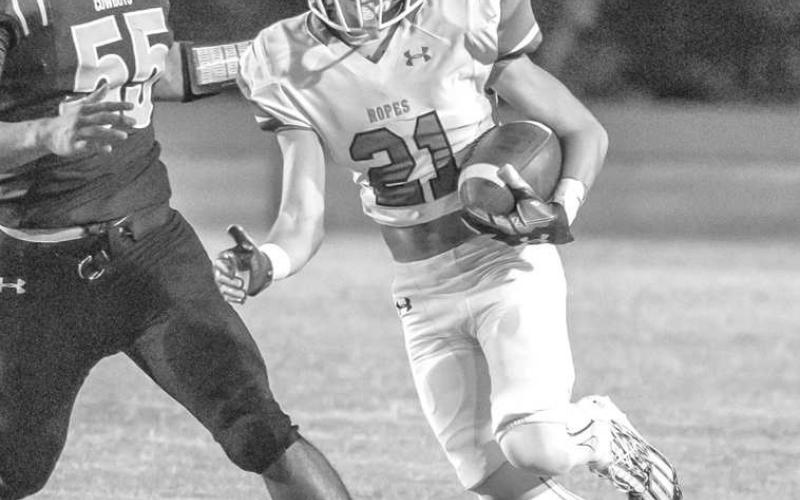 OUT OF HERE - Ropes athlete Kolter Dockery intercepted the ball from a bad pass in coverage during the Plains offensive drive last Friday. (Photo courtesy of Donovan Martin)