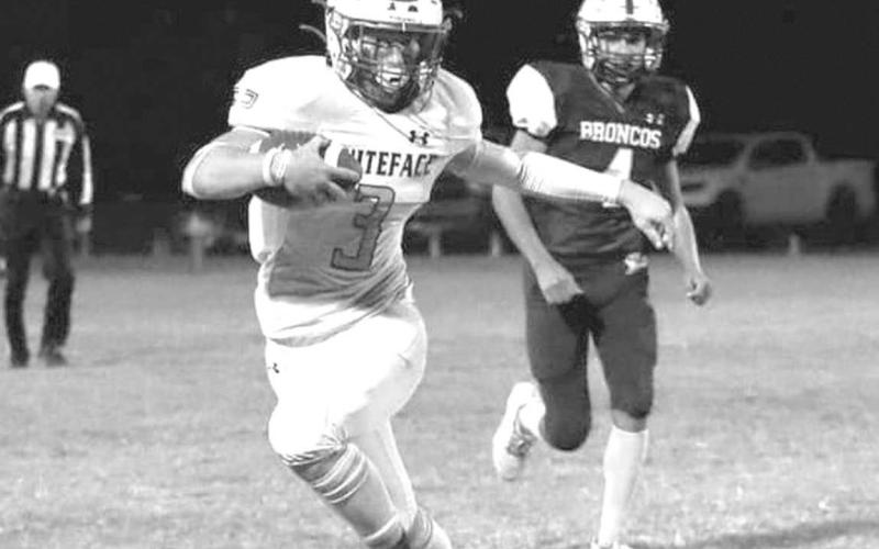 ELUSIVE - Whiteface Antelope Ethan Kauffman avoided a tackle in a 64-0 rout of the host Meadow Brondos last Friday. Whiteface is currently sixth in UIL 6-man Division I and 12th in the country according to MaxPreps. The Antelopes will host O’Donnell for the Region II, District 5 championship next Friday at 7:30 p.m. (Photo by Holly Crutcher)