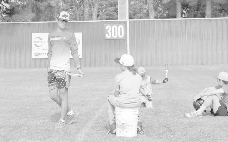 FUNDAMENTALS- Malachi Gavina was out helping the Levelland baseball coaches during the annual Levelland Baseball Camp early in the morning Friday. Gavina and the coaching staff taught youth players the fundamentals of the game. (Staff Photo by Aalijah Soliz)