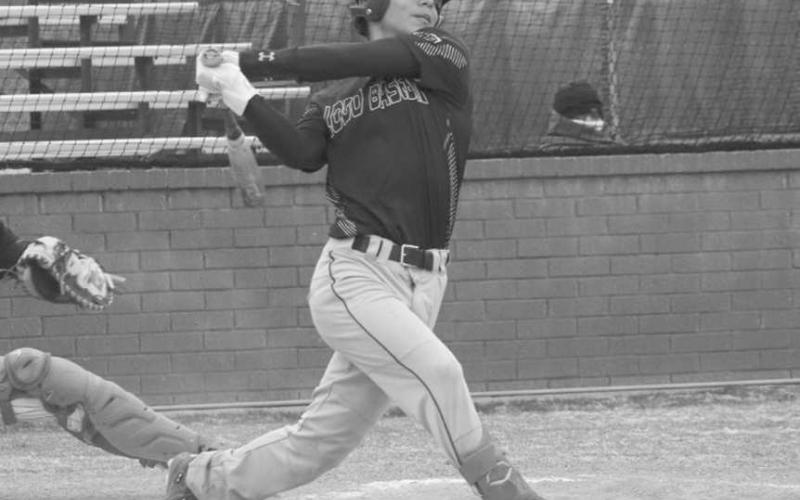 HARD SWING - Levelland Lobo Noah Tienda swung at the pitch during the team’s game against Shallowater this past Tuesday night at home. (Staff photo by Aalijah Soliz)