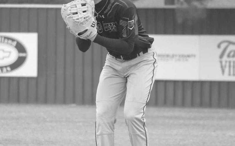 READY TO GO - Levelland Lobo Gage Potter was at the ready for the ball on first base during the team’s game against the Shallowater Mustangs at home. (Staff photo by Aalijah Soliz)