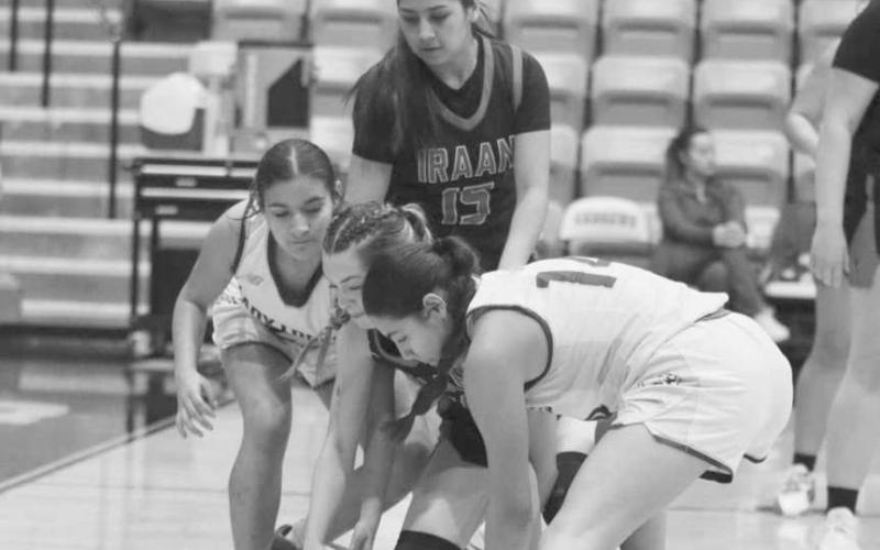 LOOSE BALL - Whiteface Lady Lope Anias Soliz fought for the loose ball during the team’s game at Andrew’s High School this past Monday night. (Photo courtesy of Holly Crutcher)