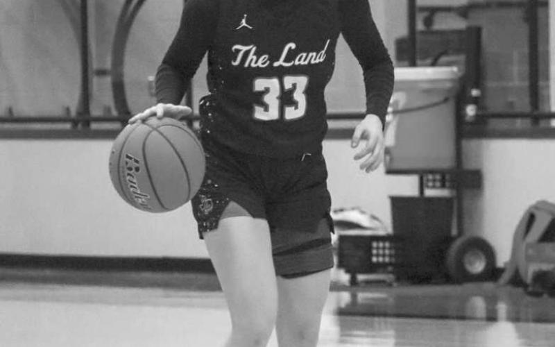 MAKE THE READ - Levelland Loboette Presley Smith scanned the court during the team’s game against Brownwood this past Monday night for their Bi-District Round of playoffs. (Staff photo by Aalijah Soliz)