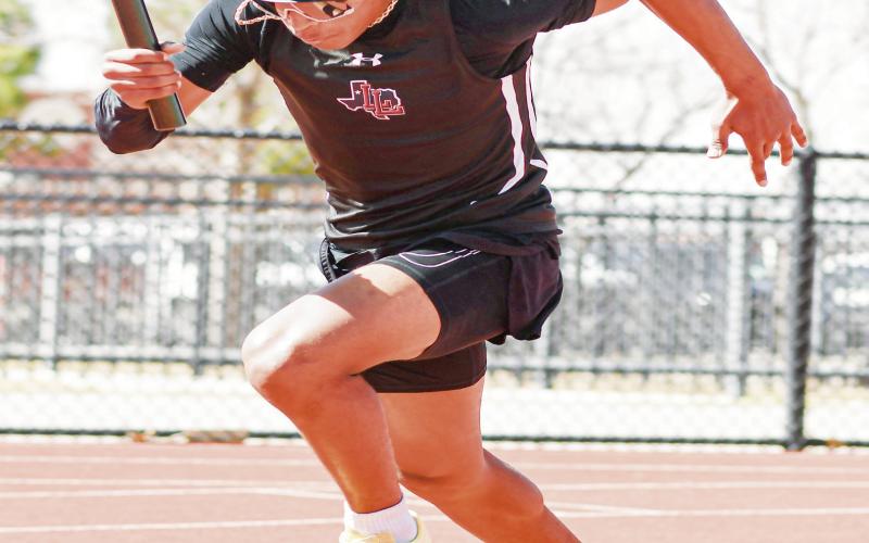 DRIVE OUT THE BLOCKS - Levelland’s Bentley Sepulbeda drives out of the blocks as the lead leg of Levelland’s varsity 4x100-meter relay during a race this past Friday at Lobo Stadium. The relay would run a 45.43 to place third overall. (Staff photo by Jentezen Smith)
