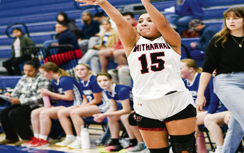 THREE-POINT THREAT - Whitharral Lady Panther Aerieana Rodriguez pulls up from three point range during their basketball game against the Lubbock Titans in the Caprock Classic this past Tuesday at Estacado High School. (Staff photo by Jentezen Smith)