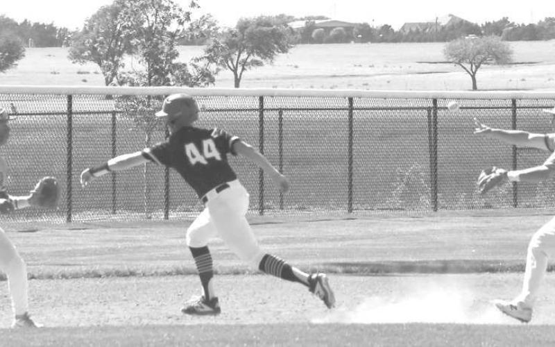 RUNDOWN- Ropes’ Braxxin Partington beat and attempted rundown in game two of the best of three UIL Class 2A Area Baseball Championship against Sunray in Dimmitt on Saturday. The Eagles won the series two games to one. (Photo Courtesy of Jay Kelley)