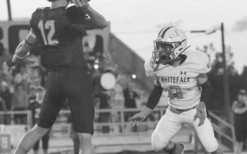 UNDER PRESSURE - Whiteface’s Cash Crutcher was a terror in the Happy Cowboys’ backfield all night in a 58-38 road win for the Antelopes on Sept. 6. The fourth ranked Antelopes hosted Boys’ Ranch last night and will host no. 14 Klondike next Friday at 7:30 p.m. (Photo by Holly Crutcher)