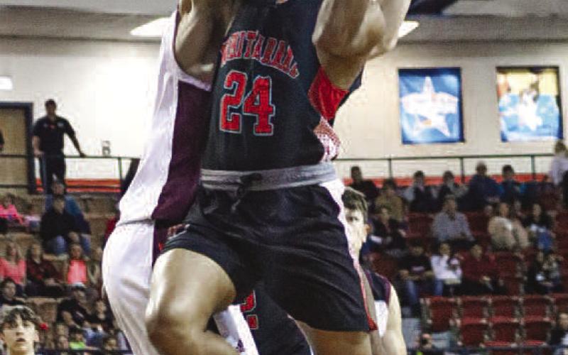 TOUGH FINISH - Whitharral Panther Nomar Gomez finished his layup during the team’s contest this past Friday at the Texan Dome. (Staff photo by Aalijah Soliz)