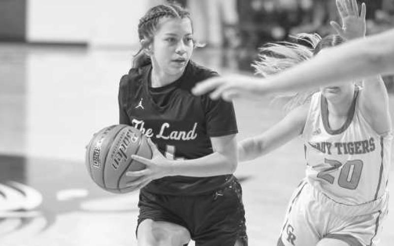 BALL SECURITY - Levelland Loboette Kaylee Penner kept the ball away from the Glen Rose defender this past Tuesday night in Abilene. (Staff photo by Dom Puente)