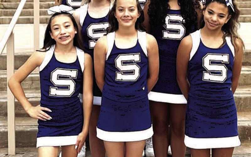 TOP “CHEER” AWARD - Smyer JH Cheerleaders attended cheer camp and earned several awards including the Top “Cheer” Award in the JH division, the Spirit Stick for the third day in a row, the Technical Excellence Award, the STAY SAFE Award, squad credentialing, a blue ribbon for spirit entrance and cheer, and one cheerleader made All-Around. (Smyer ISD photo)