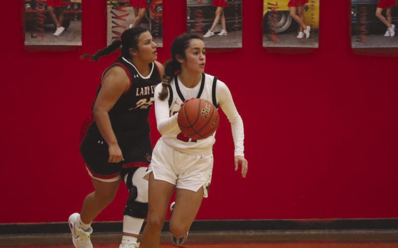 SPEED - Levelland Loboette Carly Tienda had the ball on the teams fastbreak to get an easy bucket against the Brownfield Lady Cubs. (Staff photo by Aalijah Soliz)