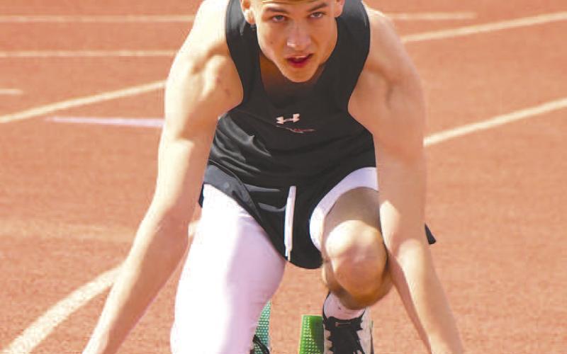 STARTING BLOCK- Levelland hosted their annual track meet last week at Levelland Middle School. Lobo sprinter Ben Alvarado took his mark in the starting blocks during the meet. (Photo Courtesy of Dom Puente)