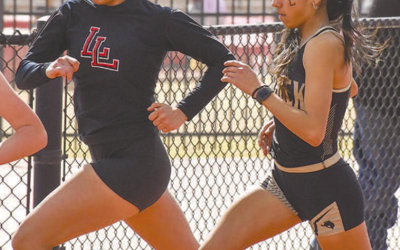 DISTANCE RUNNER- Levelland hosted their annual track meet last week at Levelland Middle School. Loboette distance runner Mia Morin rounded the track during a race at the meet. (Photo Courtesy of Dom Puente)