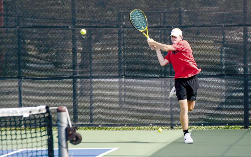 BACKHAND IT – Levelland Tennis Packs Reese Payton made a two-handed backhand play on the ball to keep it in play during a tennis match against All Saints on August 12 at the Burgess-Rushing Tennis Center in Lubbock. (Staff photo by Jentezen Smith)