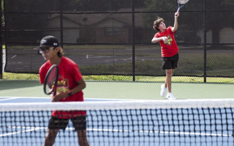 READY &amp;amp; SERVE – LHS Tennis Packs Eduardo Perez-Garcia prepared for the play while his teammate Jacob Cisneros served the ball during a tennis match against All Saints on August 12 at the Burgess-Rushing Tennis Center in Lubbock. (Staff photo by Jentezen Smith)