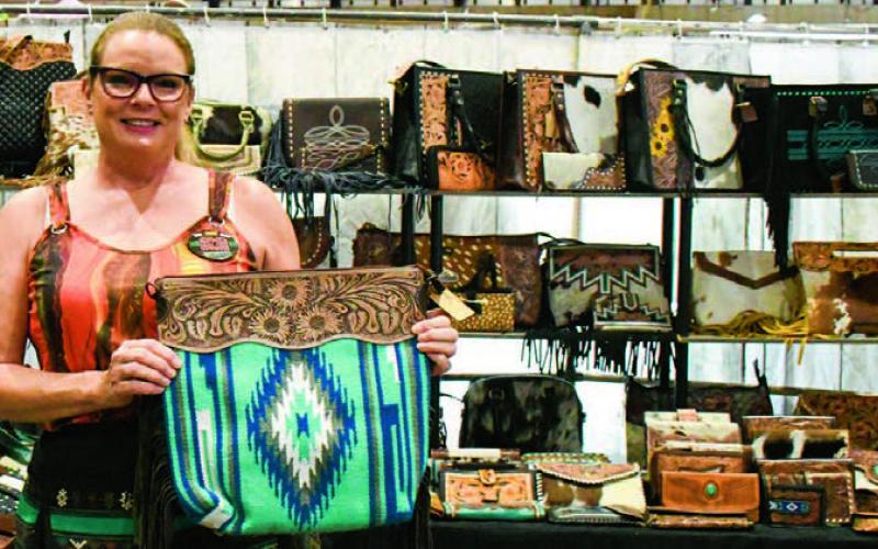 HOMEMADE BAGS - There was so many unique treasures at the Petticoats on the Prairie at the Mallet Event Center and Arean on Friday and Saturday, starting with this gorgeous western bag. (Staff photo by Hannah Woodrum)