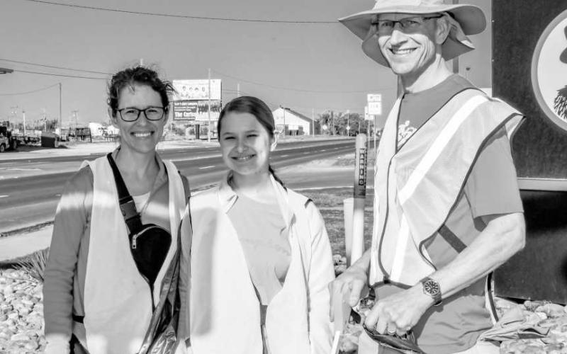 SPRING INTO ACTION - The Neiderhauser family smiled big as they volunteered their time to help clean up along Highway 114 in Levelland during Keep Levelland Beautiful’s (KLB) Spring Cleanup this past Saturday. (Staff photo by Hannah Woodrum)