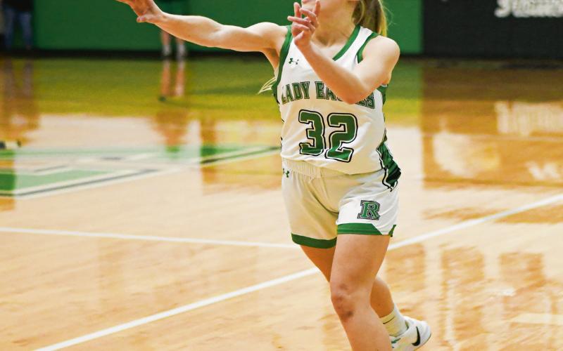 PASS THE ROCK - Ropes junior Macie Lehnen passes the basketball to her Lady Eagle teammate during their game against Olton this past Tuesday at Ropes High School. Lehnen would finish with seven rebounds, two steals and an assist. (Staff photo by Jentezen Smith)