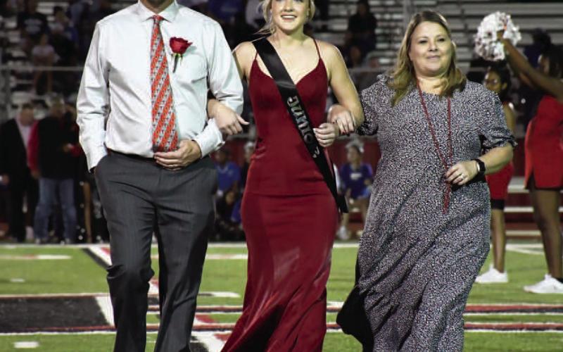 JUNIORHOMECOMING - Levelland High School held their Homecoming last week during the Lobos vs. Estacado football game on Friday. Making up the Homecoming Court was junior Mikaela Browder who was escorted by her parents Scott and Tiffany Browder. (Staff Photo by Dominick Puente)