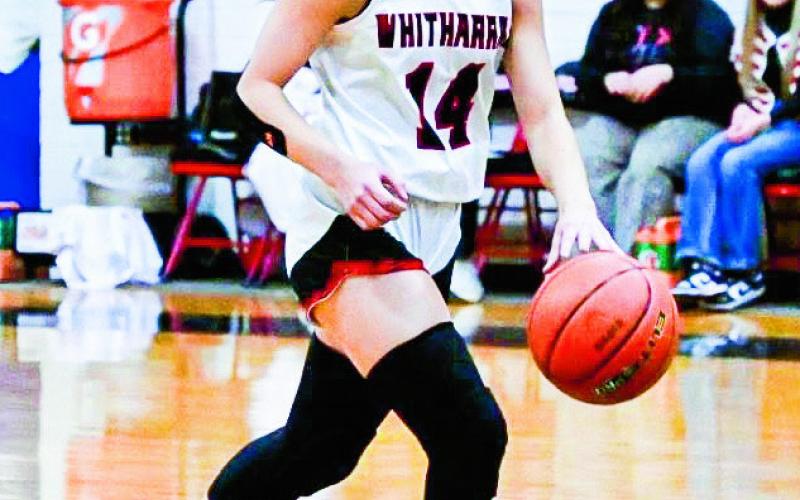 BRING IT UP - Whitharral junior Paige Smith dribbles the basketball up the court during the Lady Panthers game against Spur this past Tuesday night at Whitharral High School. Smith led the Lady Panthers with 18 points scored, adding seven assists, three steals and a block. (Photo provided by Jamie Will Kristinek Facebook)