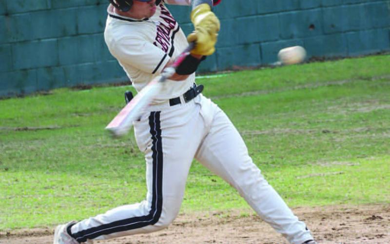 OUT OF THERE - Levelland Lobo Rusty Johnson swung at the pitch during the team’s game against the Sweetwater Mustangs this past Wednesday night as the visiting team. (Staff photo by Aalijah Soliz)